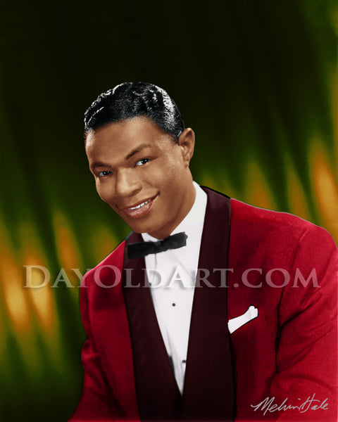 Vintage-style portrait print of Nat King Cole in a red tuxedo jacket with a white shirt, black bow tie, and white pocket square, set against a dark green and gold blurred background. 'DAYOLDART'